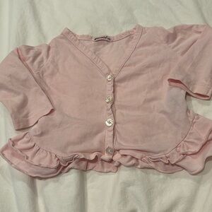 Pink ruffled cardigan